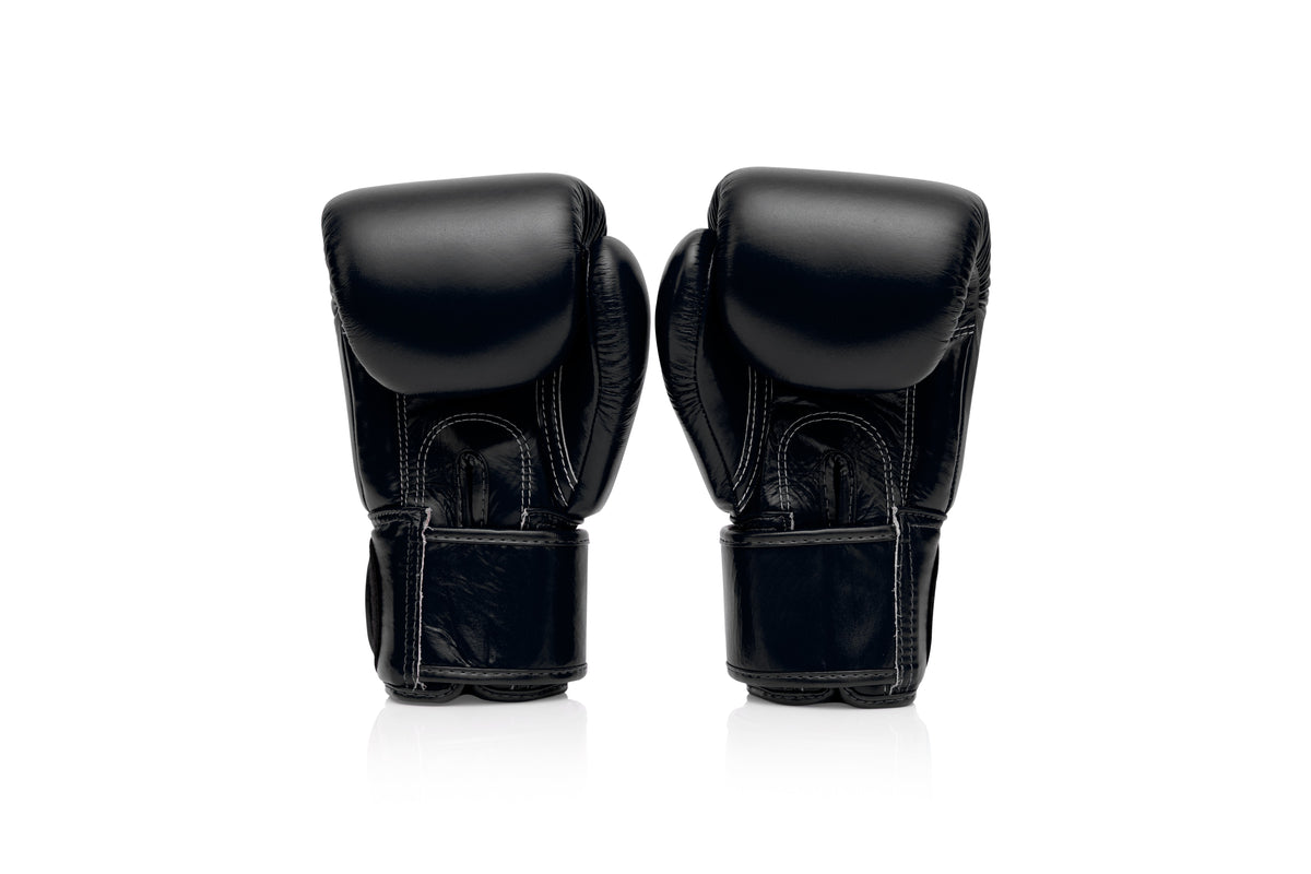 Fairtex BGV1 black boxing gloves close-up - genuine leather