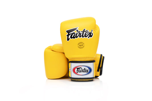 Fairtex BGV1 Yellow Boxing Gloves – front view with tight-fit design and premium leather