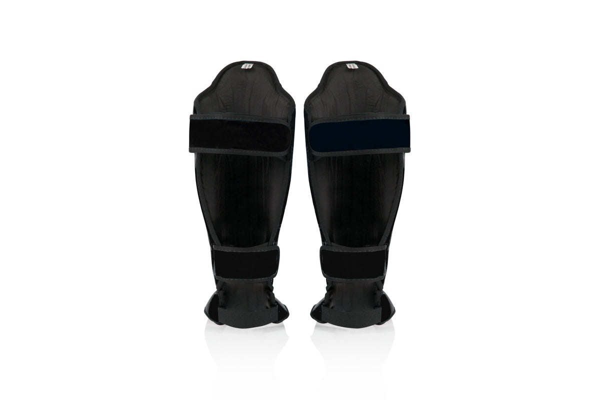 Fairtex SP5 black shin guards close-up detail - Sydney