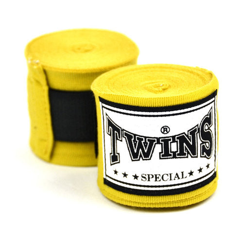 Twins Special Hand Wraps – yellow cotton wraps for wrist and knuckle support in Muay Thai and boxing.